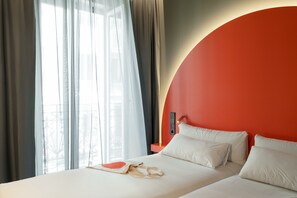 Habitación Deluxe | Minibar, caja fuerte, cortinas opacas y sistema de insonorización