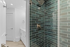 Shower, hair dryer, towels, soap