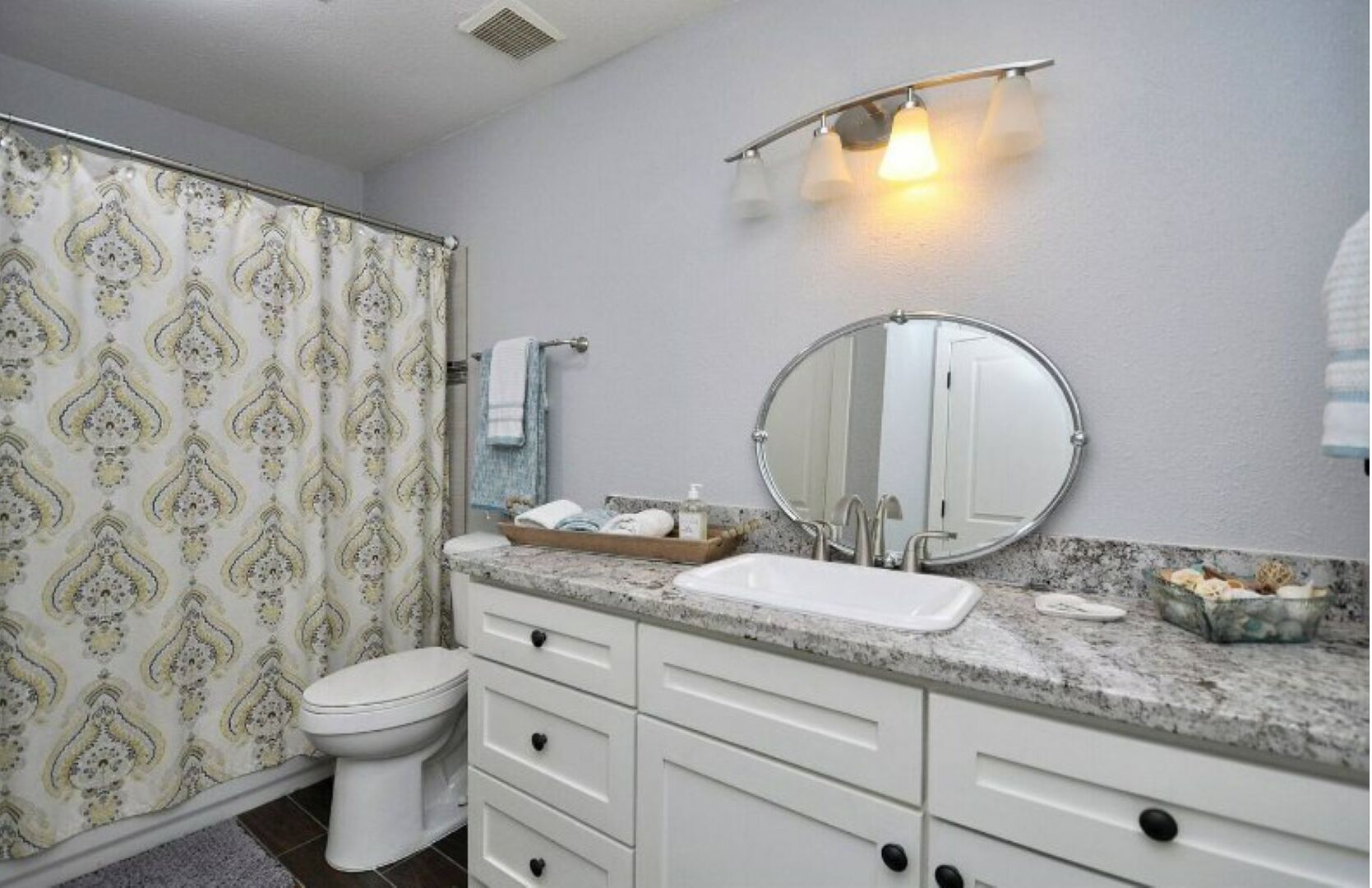 Bathtub, hair dryer, towels, soap