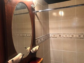 Shower, towels, soap, toilet paper