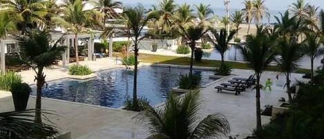 Exclusive Apartment | Outdoor pool | 2 outdoor pools, open 8:00 AM to 4:00 PM, pool umbrellas, sun loungers