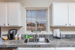 Coffee/tea maker, fridge, microwave, oven