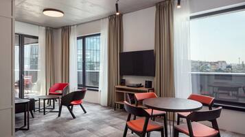 Suite, 1 Bedroom, Balcony | Living room | 140-cm LCD TV with satellite channels, TV