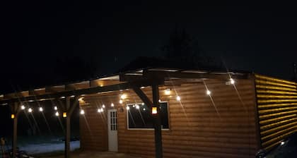 Modern Log Cabin with indoor and outdoor jacuzzi tubs