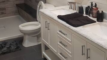Bathtub, jetted tub, hair dryer, towels