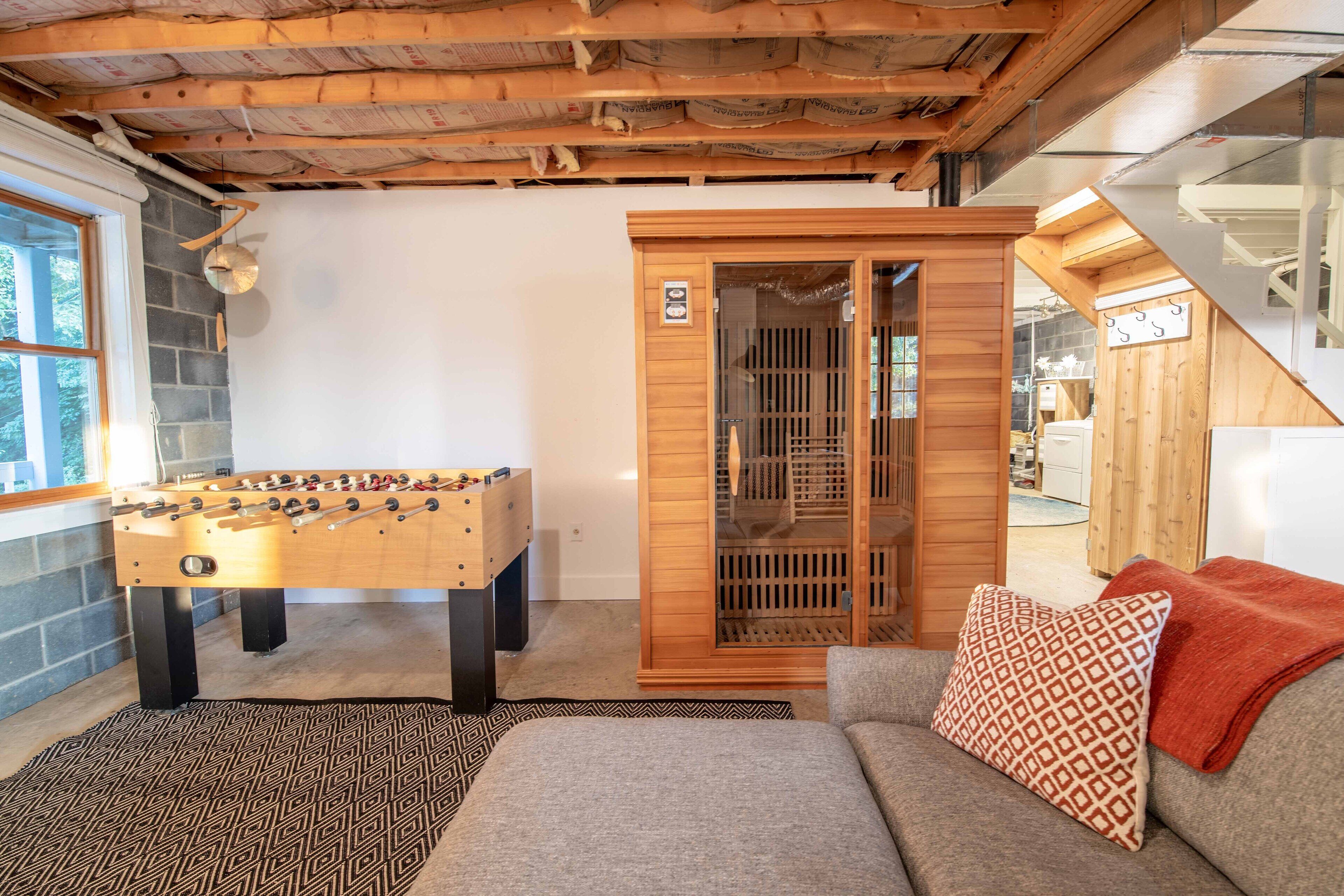 Smart TV, fireplace, table football, books