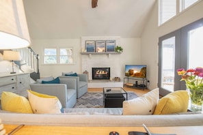 Smart TV, fireplace, table football, books