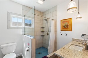 Shower, hair dryer, towels - Boutique Hotel Folly Room 1: King Suite with large private balcony in the heart of Folly Beach (Folly Beach)