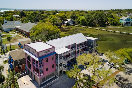 Exterior. Boutique Hotel Folly Room 1: King Suite with large private balcony in the heart of Folly Beach