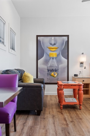 TV. Boutique Hotel Folly Room 4: King Studio - cozy porch views of the Folly River
