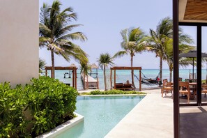 Outdoor pool, open 8:00 AM to 10:00 PM, pool umbrellas, sun loungers