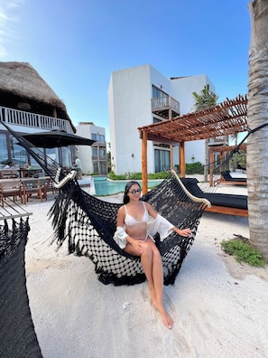 On the beach, sun loungers, beach umbrellas, beach towels