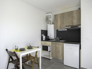 Fridge, microwave, coffee/tea maker, toaster