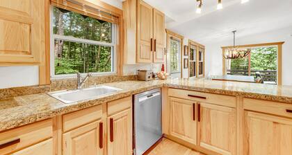 Dog-Friendly Wooded Chalet w/ Fast WiFi, a Private Hot Tub, & Furnished Decks