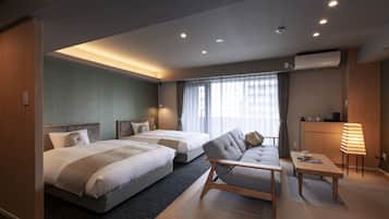 Deluxe Twin Room, Non Smoking | In-room safe, desk, blackout curtains, free WiFi