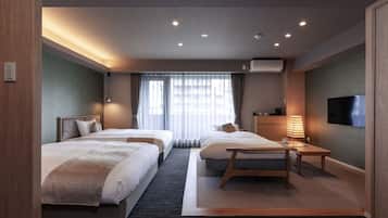 Deluxe Twin Room, Non Smoking | In-room safe, desk, blackout curtains, free WiFi