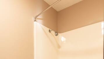 Combined shower/bathtub