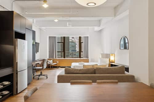 Studio Queen Gourmet | Living area | 60-inch Smart TV with digital channels, TV, Netflix