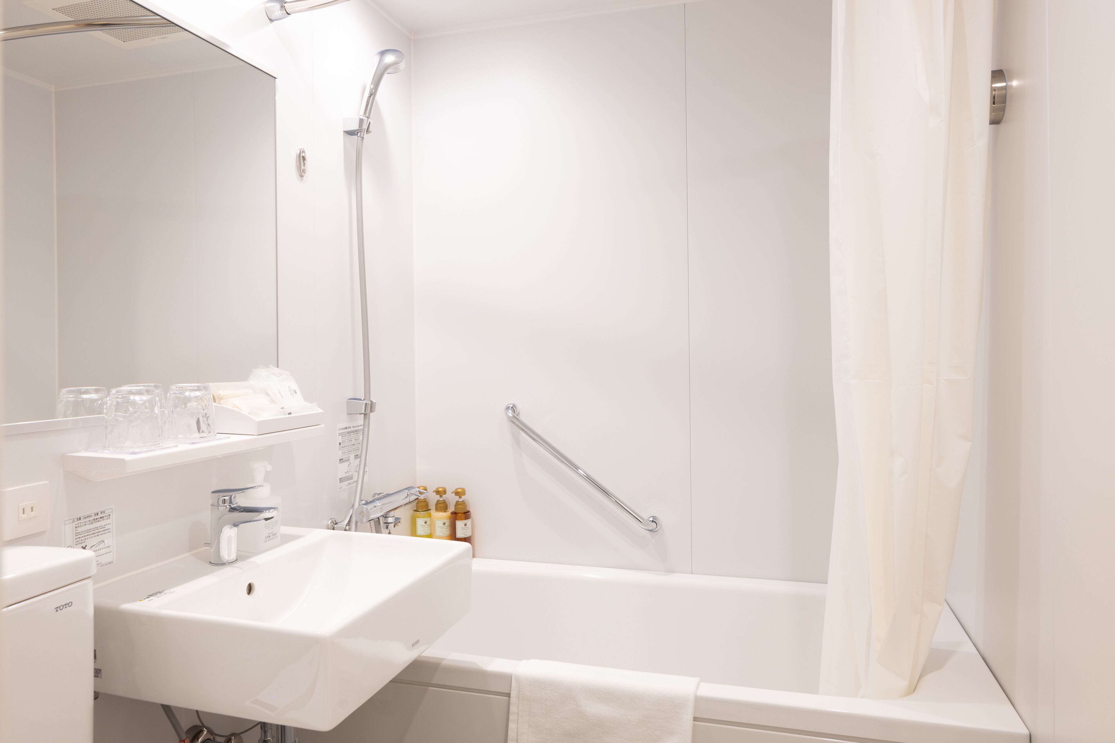 free toiletries, hair dryer, slippers, bidet