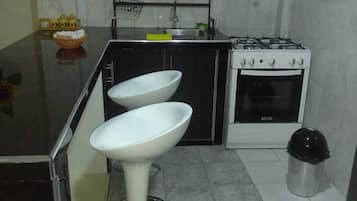 Microwave, oven, coffee/tea maker, cookware/dishes/utensils