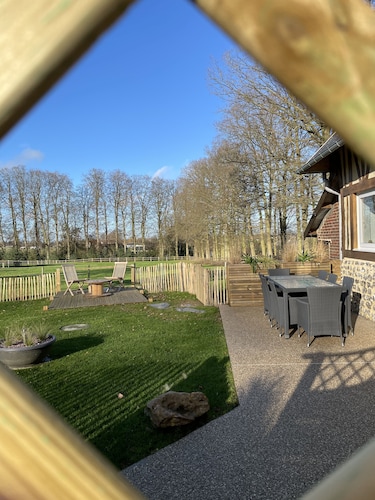 Norman house in enclosed hovel with garden