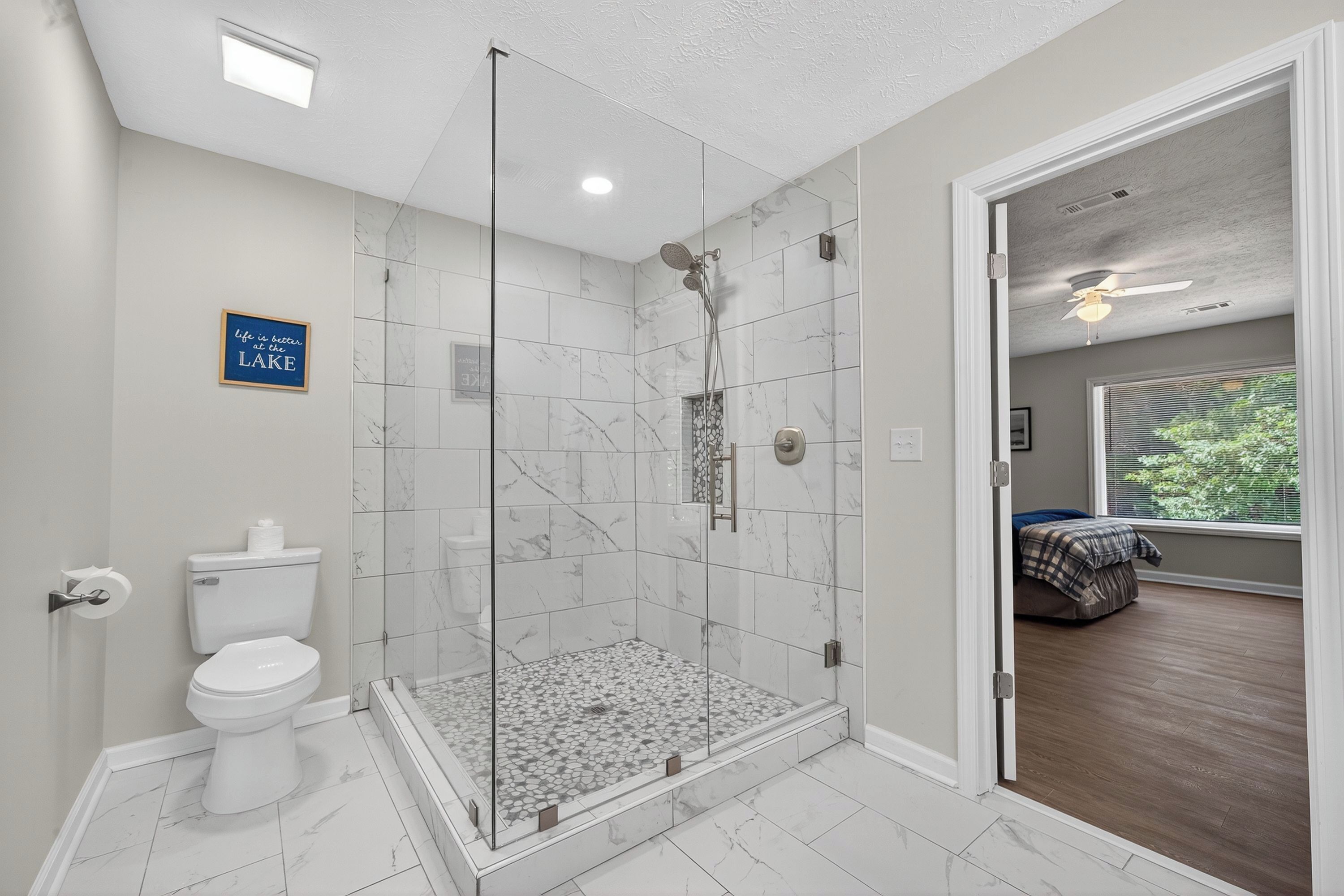 Combined shower/tub, hair dryer, towels, toilet paper
