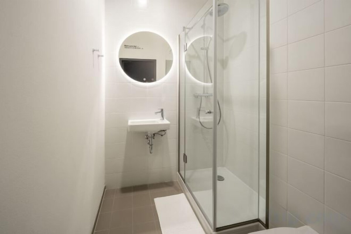 Shower, rainfall showerhead, soap, shampoo