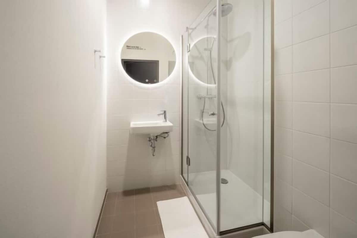 Shower, rainfall showerhead, soap, shampoo