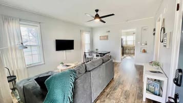 Smart TV, fireplace, table football, books