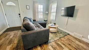 Smart TV, fireplace, table football, books