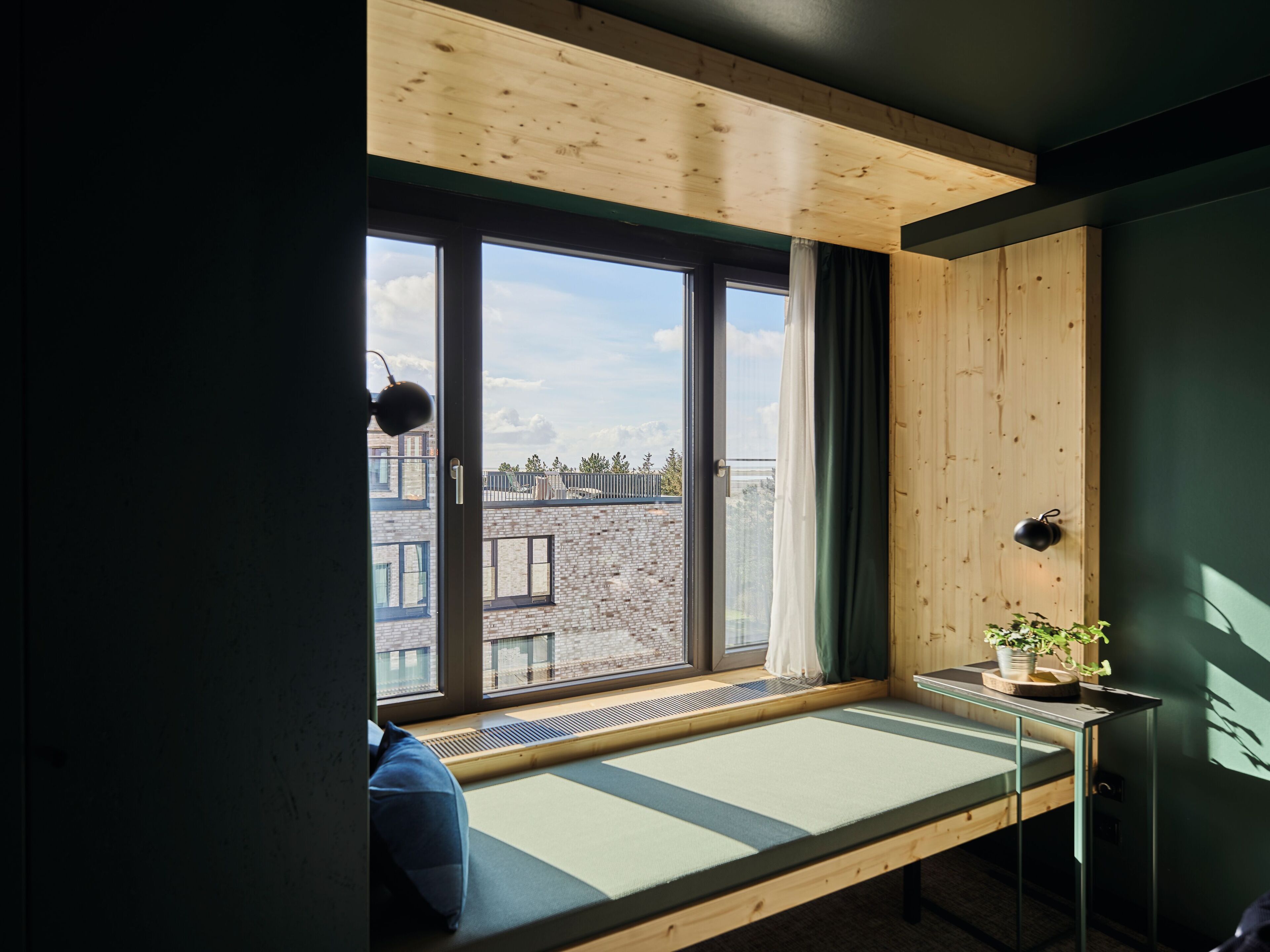 into the hood doppelzimmer, neighborhood view | living area | 49-inch tv with satellite channels