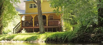 Yellow Cabin on the River by RedAwning