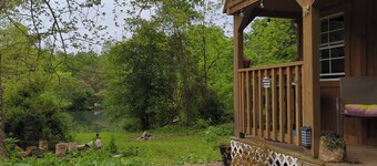 Escape to Serenity: Off-Grid Cabin on Spring-Fed Pond, Your
Private Sanctuary.