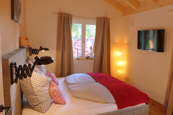 Schlafzimmer mit Flachbildschirm