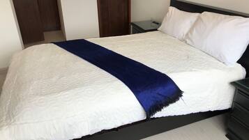 1 bedroom, desk, iron/ironing board, travel crib