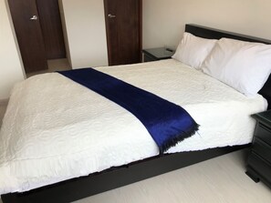 1 bedroom, desk, iron/ironing board, travel crib