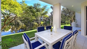 Outdoor dining - Luxury Lakeside Villa (Mount Coolum)