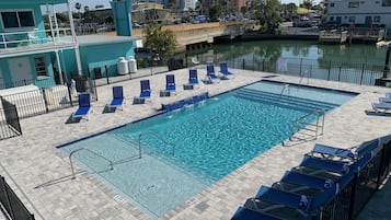 Outdoor pool, open 9:00 AM to 7:00 PM, pool umbrellas, sun loungers