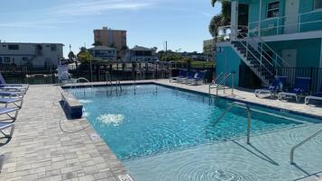 Outdoor pool, open 9:00 AM to 7:00 PM, pool umbrellas, sun loungers