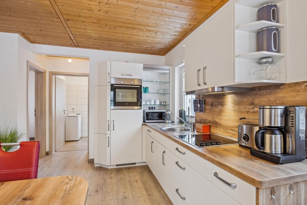 Fridge, stovetop, dishwasher, coffee/tea maker