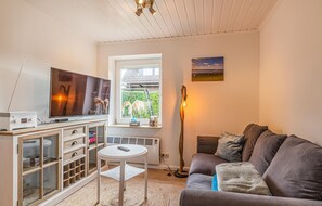 Smart-TV, Kamin, Stereoanlage