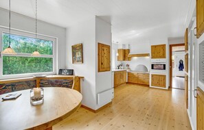 Fridge, stovetop, dishwasher, coffee/tea maker