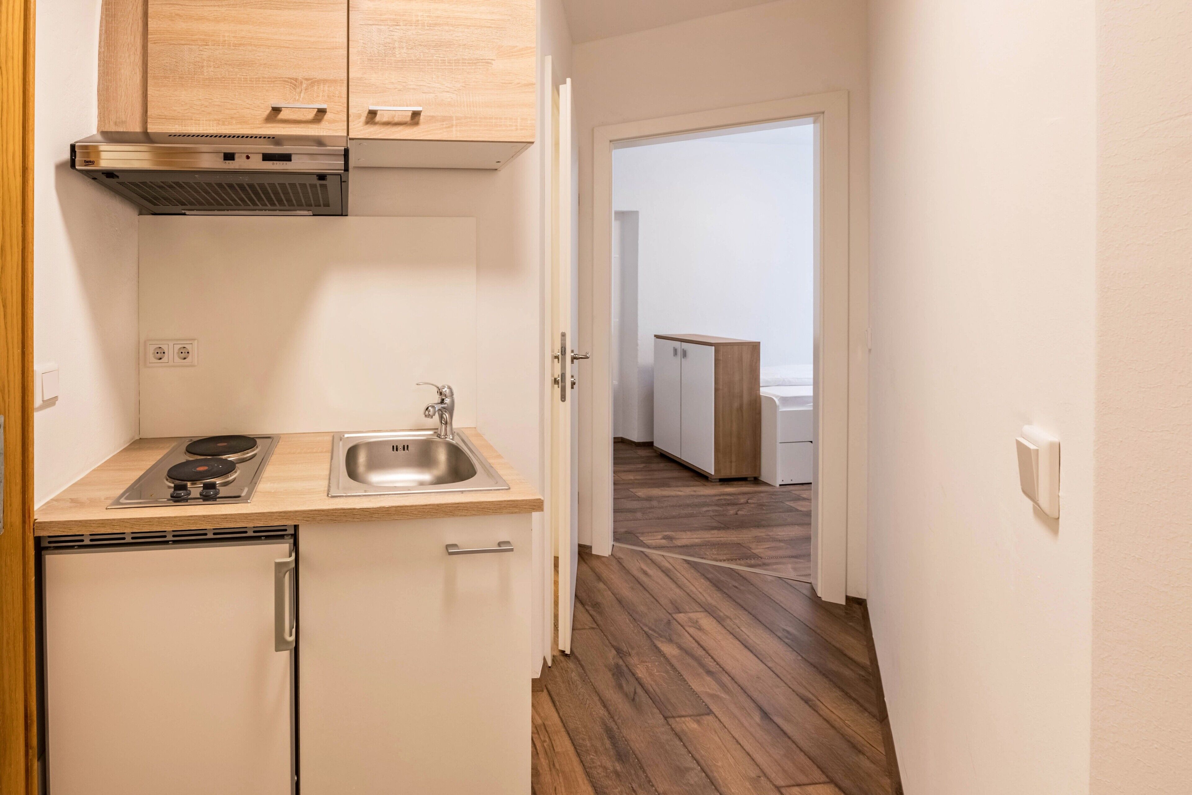 Fridge, microwave, stovetop, coffee/tea maker