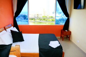 Departamento básico | 2 habitaciones, tabla de planchar con plancha y wifi gratis 