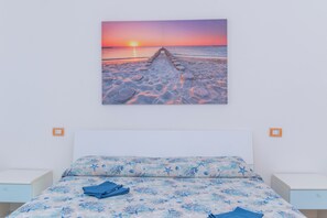 2 dormitorios, tabla de planchar con plancha, wifi gratis y ropa de cama