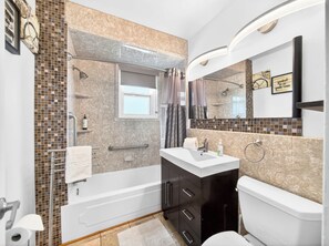 Shower, hair dryer, towels