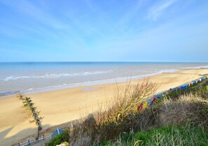 Enjoy a serene beach experience with access to the ocean and a natural, unspoiled shoreline.