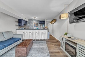 Smart TV, fireplace, books - Coastal Cozy Condo: Pet Friendly! Steps to Beach, Perfect for Relaxing Getaways! (Carolina Beach)