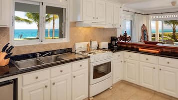 Fridge, cookware/dishes/utensils, dining tables