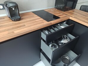 Fridge, microwave, stovetop, coffee/tea maker